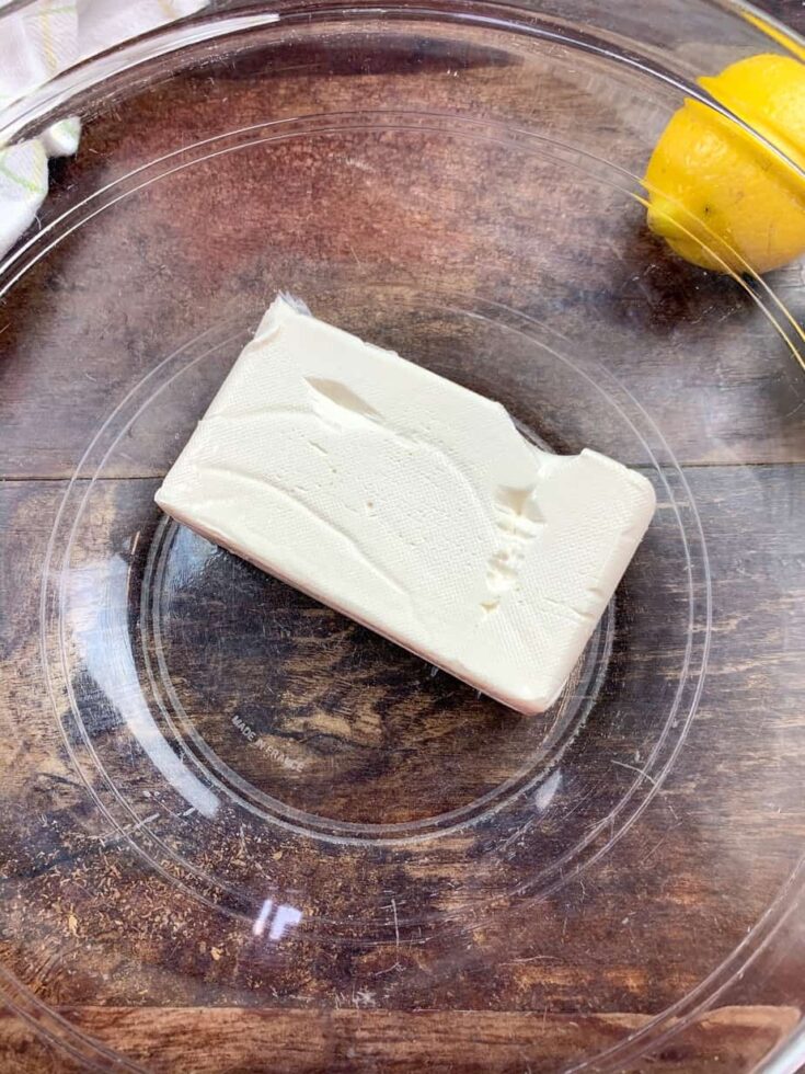 Cream cheese in a large glass bowl