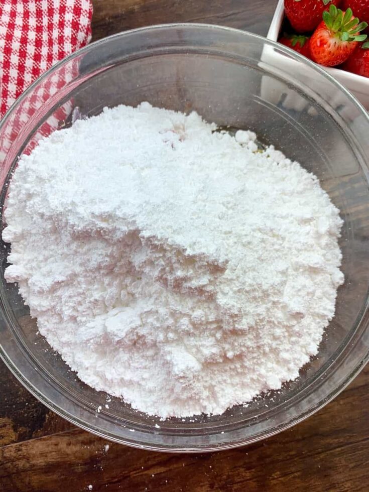 Powdered sugar in a glass bowl