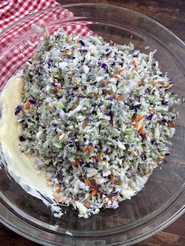 Shredded cabbage for coleslaw in a glass bowl