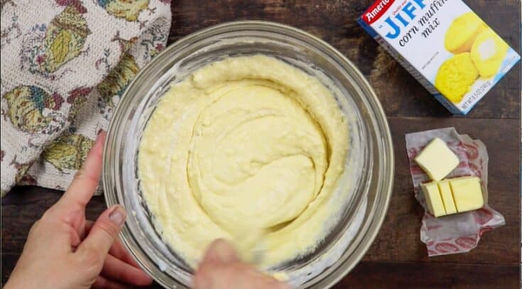 Mixing the Jiffy Cornbread pancake recipe in a glass bowl