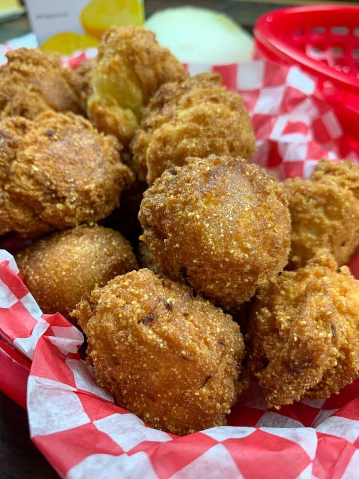 Hush puppies stacked in a basket